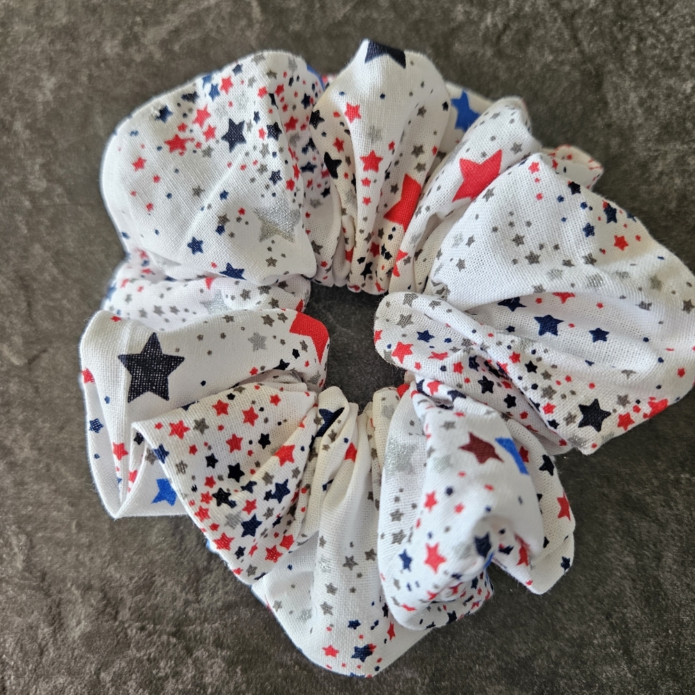 White scrunchie with red and blue stars